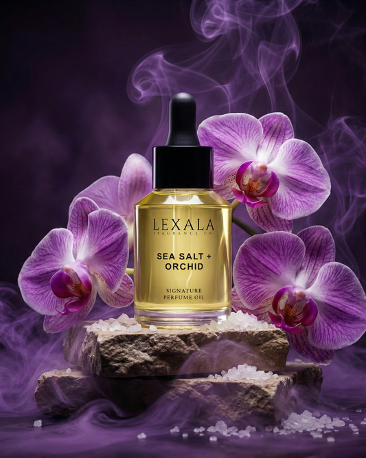 Lexala Sea Salt & Orchid perfume oil bottle with purple orchids and smoke on a dark background